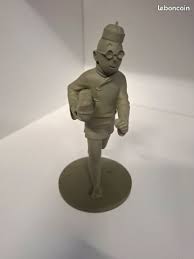 FIGURINE / TINTIN / TINTIN AU PAQUET